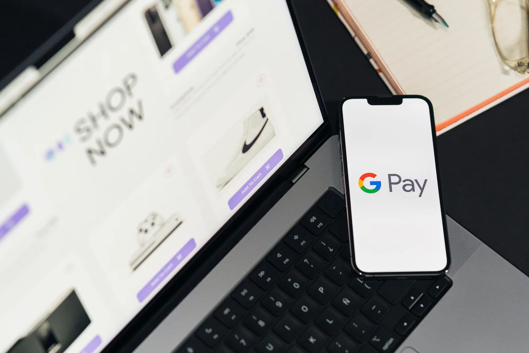 A foreign credit card lying next to a phone showing the WeChat Pay linked-card screen with refund status