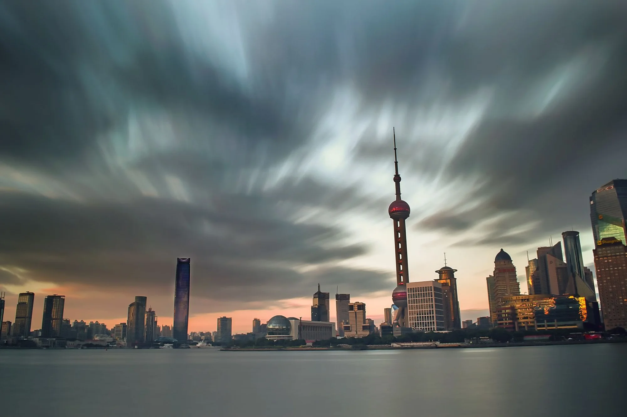 The Shanghai skyline along the Huangpu River at dusk
