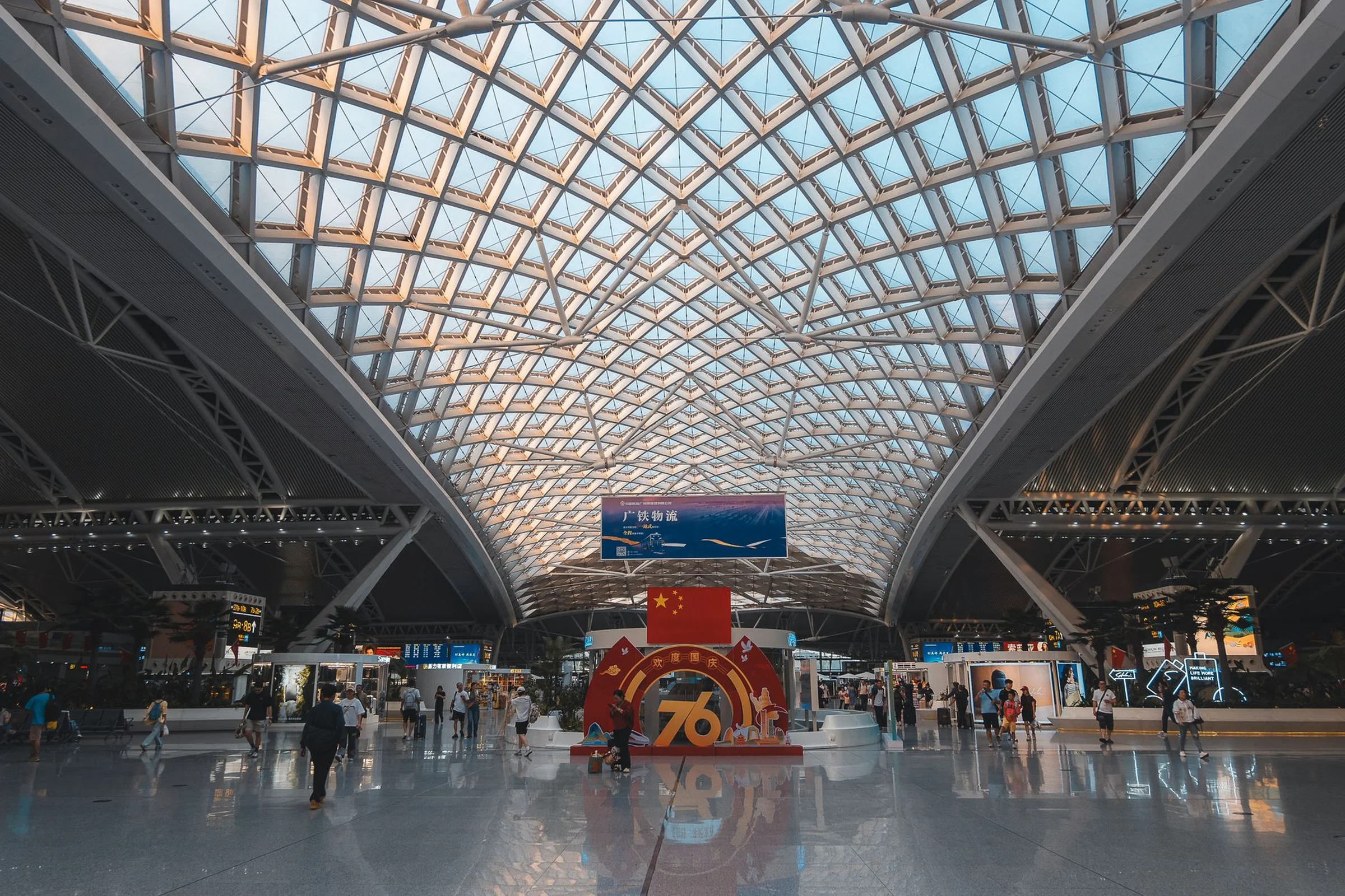 The sunlit vaulted interior of a Chinese airport terminal