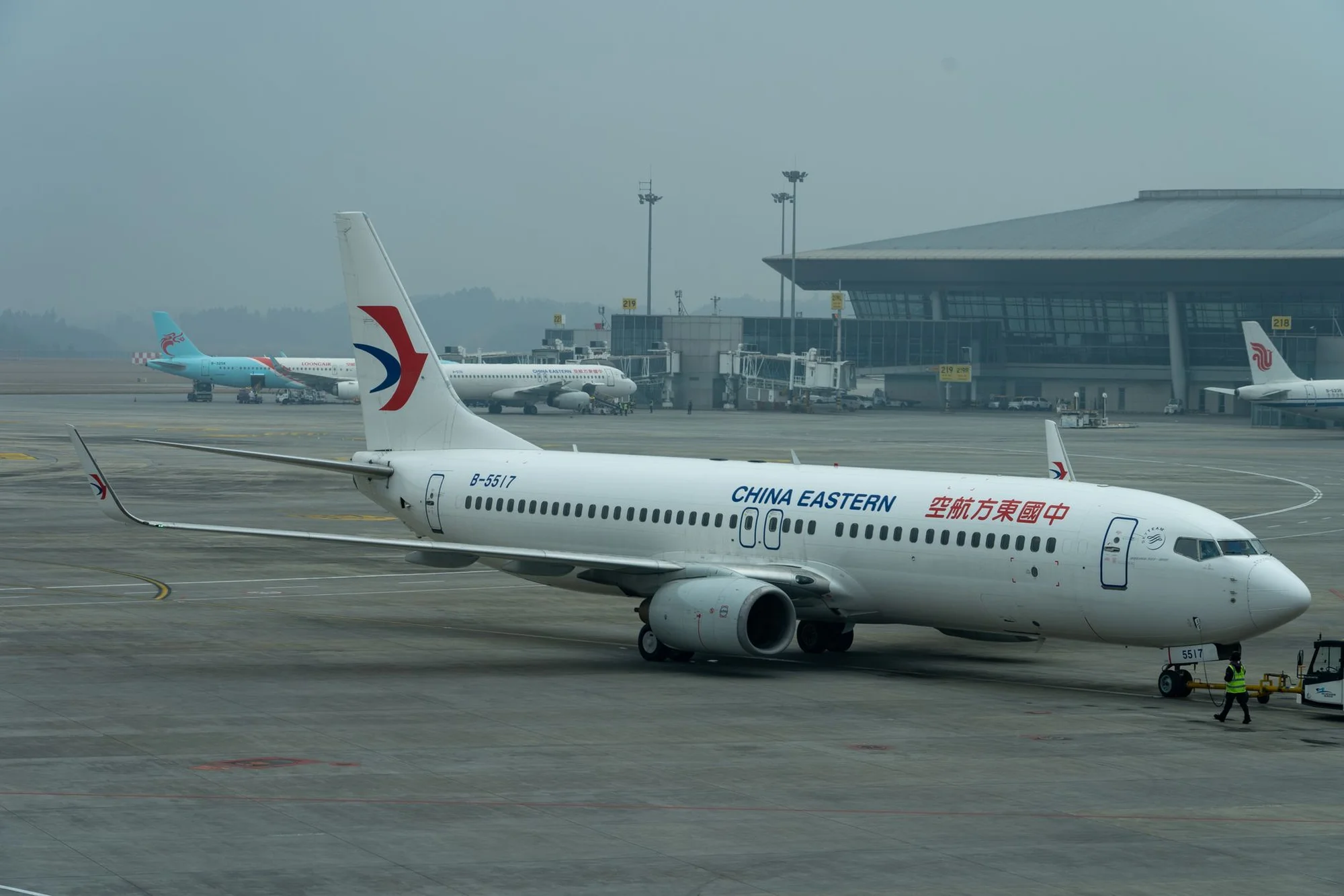 A China Eastern Airlines Boeing 737 parked at the apron of a Chinese airport