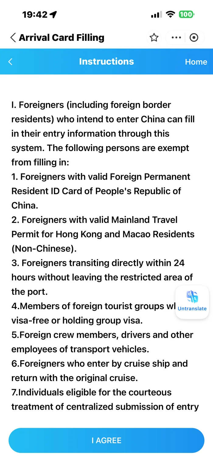 Arrival card instructions screen showing who must file and the blue I AGREE button